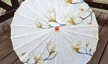 Cultura tradizionale con fascino globale: ombrelli di carta oleata