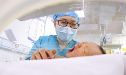 Cina: estensione copertura assicurazione medica di base per i bambini