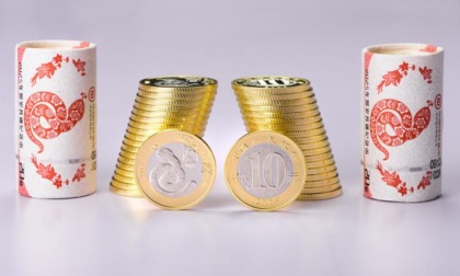 Cina: Pechino, emesse monete, banconote commemorative per Capodanno (3)