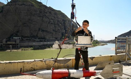 Cina: guardiani del fiume Giallo a stazione idrologica di Longmen (1