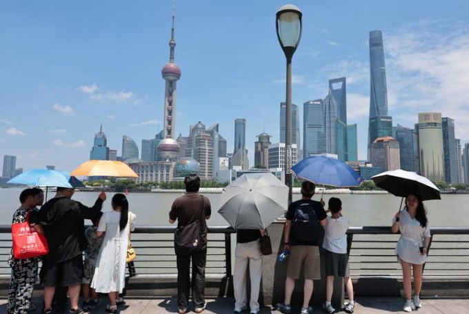 Cina: emette allerte per caldo, temporali