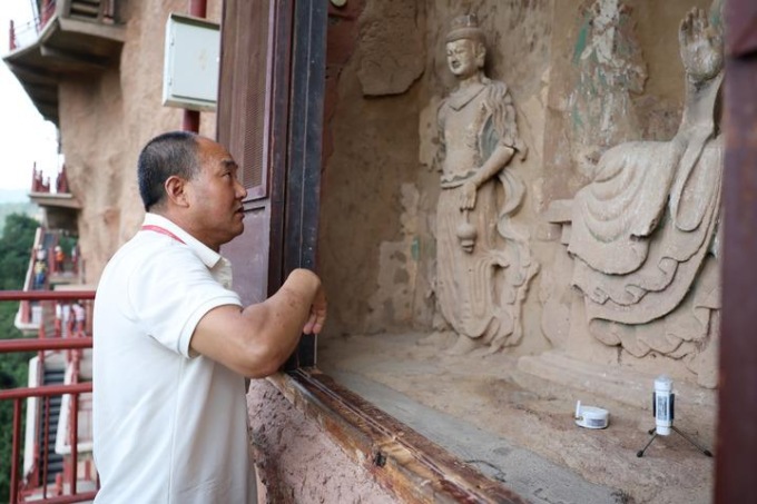 Cina: restauratore di reperti culturali dedica 40 anni alle grotte del Monte Maiji