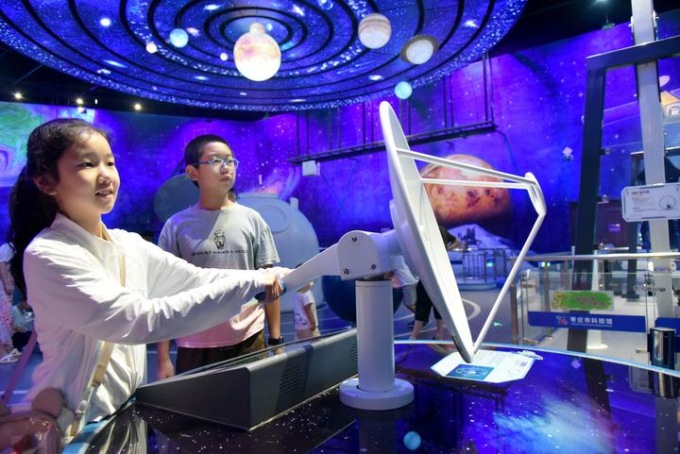 Cina: bambini svolgono attività durante vacanze estive (2)