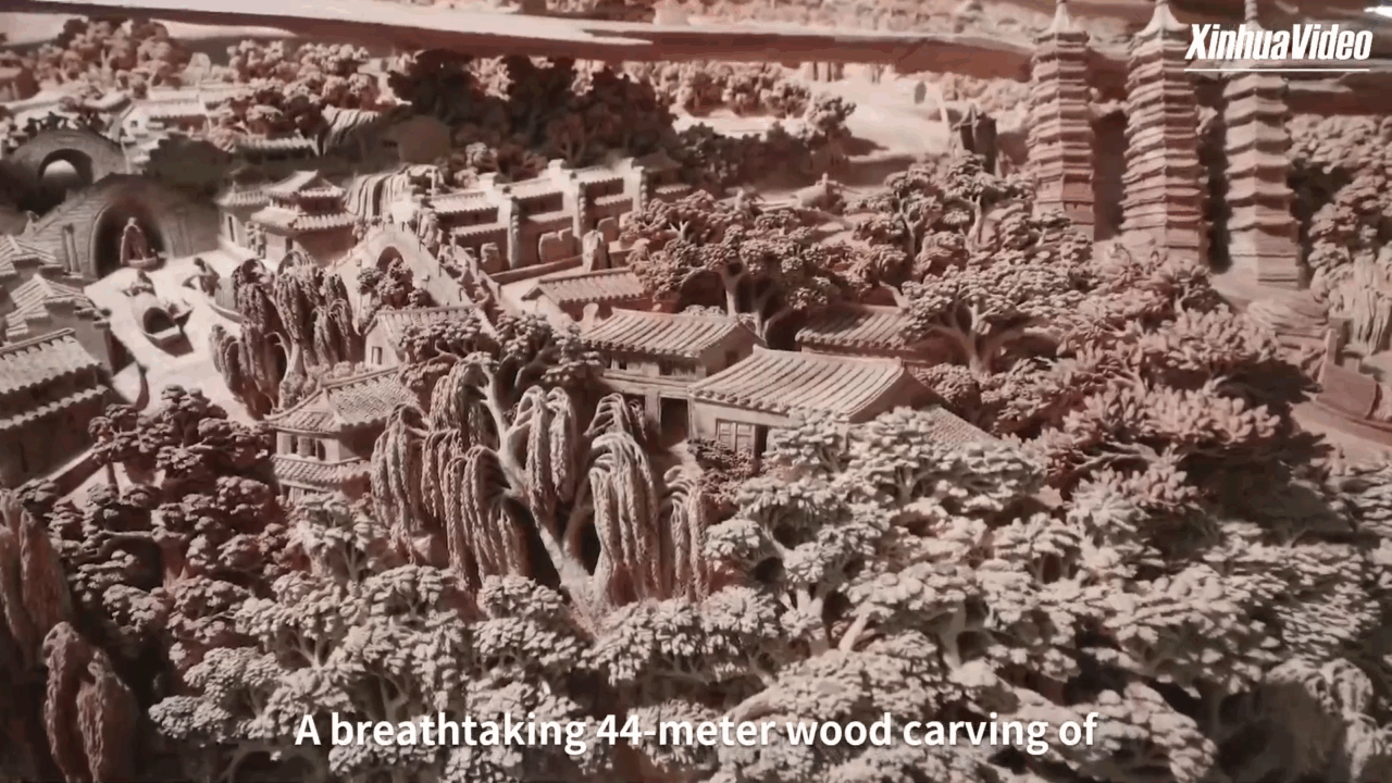 Cina: scultura in legno lunga 44 metri dà vita al Grande Canale