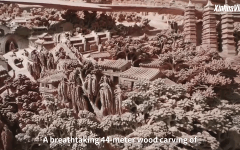 Cina: scultura in legno lunga 44 metri dà vita al Grande Canale